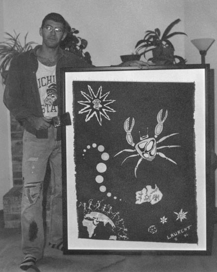Photo of Laurent next to painting
